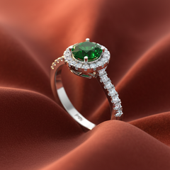 Emerald With Four-Prong Halo