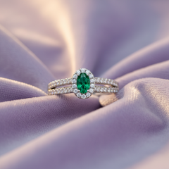 Oval Emerald With Diamond Ring