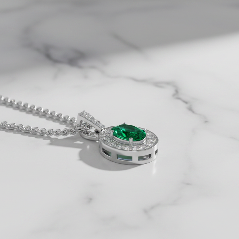 Oval Emerald Diamond Halo Solitaire